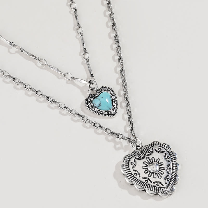 Ensemble de bijoux avec pendentif et boucles d'oreilles en forme de croix d'amour turquoise Olivenorma