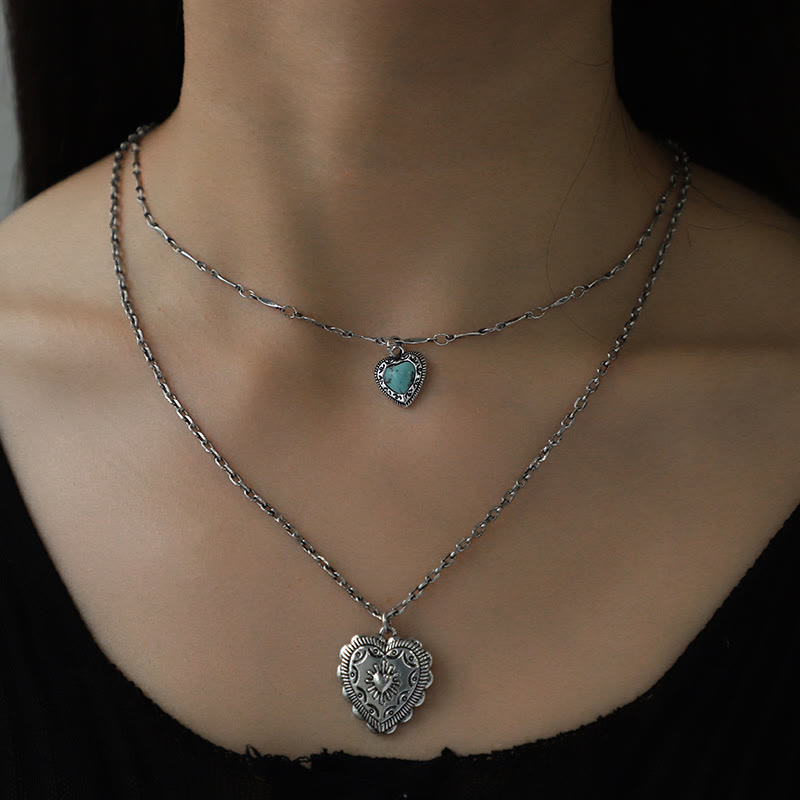 Ensemble de bijoux avec pendentif et boucles d'oreilles en forme de croix d'amour turquoise Olivenorma