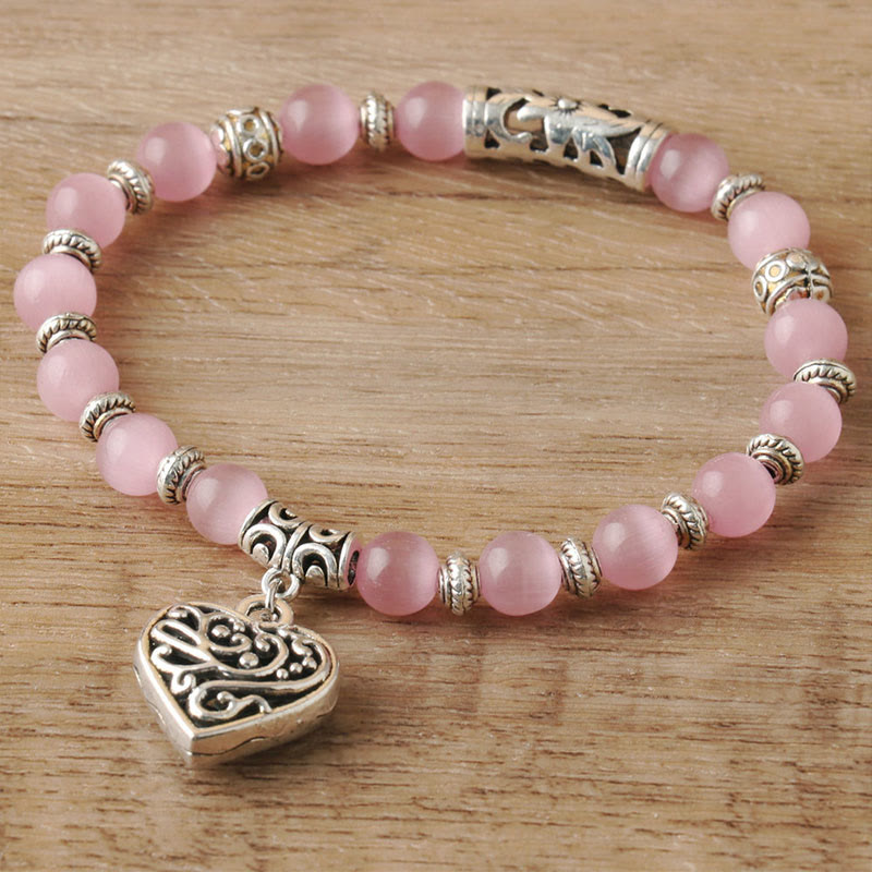 Bracelet œil de chat rose avec pendentif Hollow Love Olivenorma