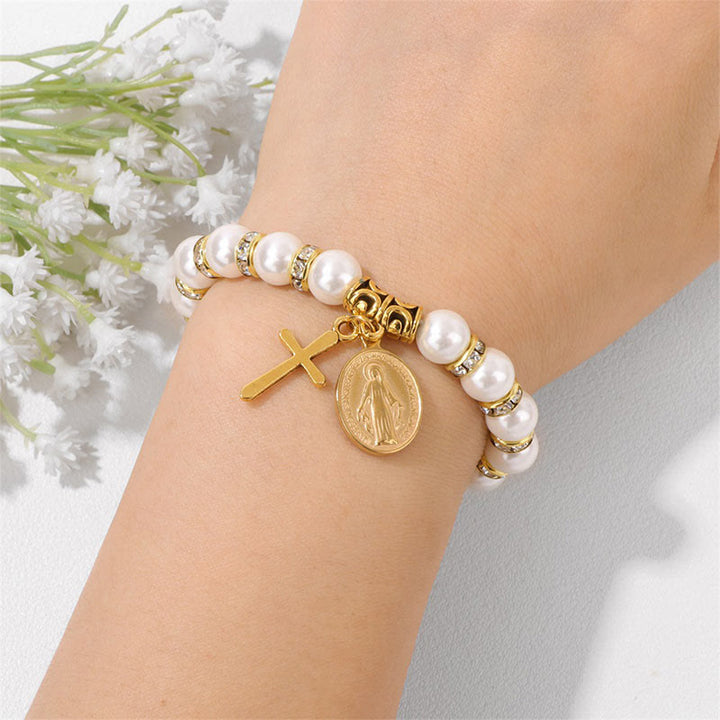 Bracelet en perles de coquillage blanc avec croix chrétienne Olivenorma