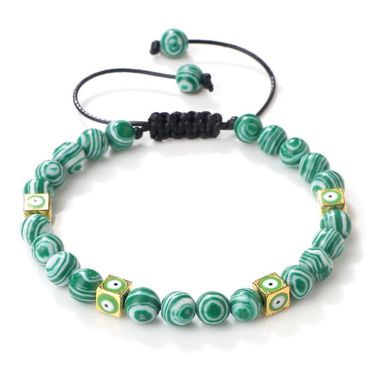 Bracelet tressé en perles de cristal naturel contre le mauvais œil Olivenorma