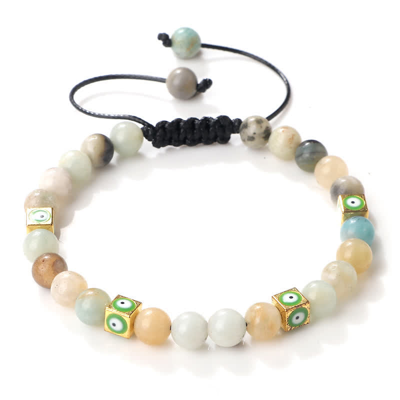 Bracelet tressé en perles de cristal naturel contre le mauvais œil Olivenorma