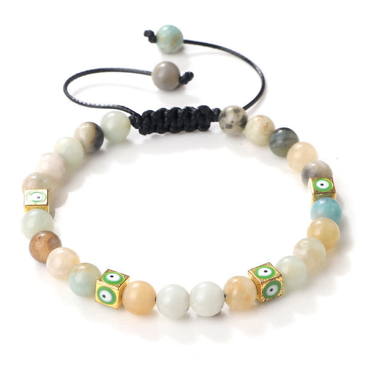 Bracelet tressé en perles de cristal naturel contre le mauvais œil Olivenorma