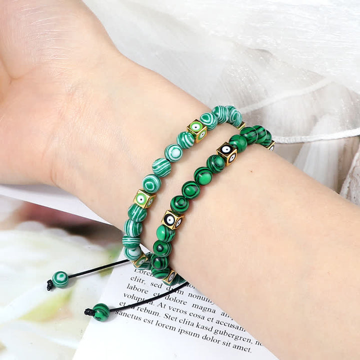 Bracelet tressé en perles de cristal naturel contre le mauvais œil Olivenorma