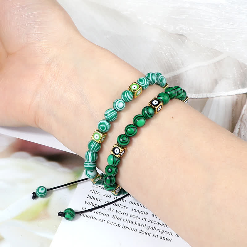 Bracelet tressé en perles de cristal naturel contre le mauvais œil Olivenorma