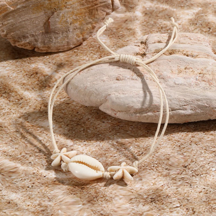 Bracelet de plage avec pendentif tortue étoile de mer turquoise blanche Olivenorma