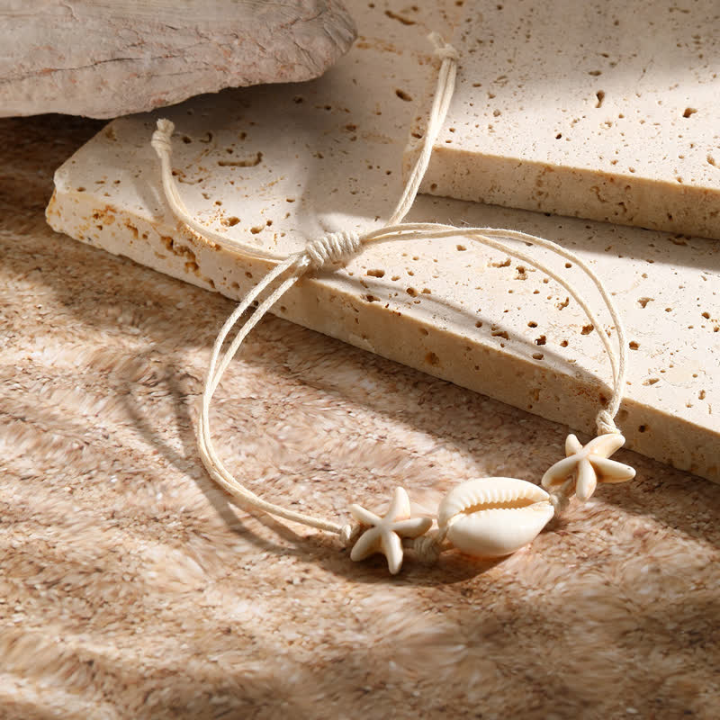 Bracelet de plage avec pendentif tortue étoile de mer turquoise blanche Olivenorma