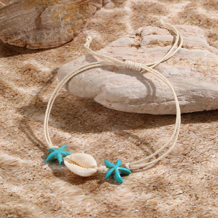 Bracelet de plage avec pendentif tortue étoile de mer turquoise blanche Olivenorma