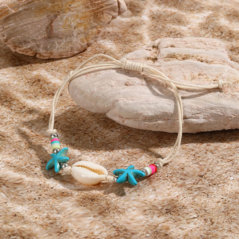Bracelet de plage avec pendentif tortue étoile de mer turquoise blanche Olivenorma