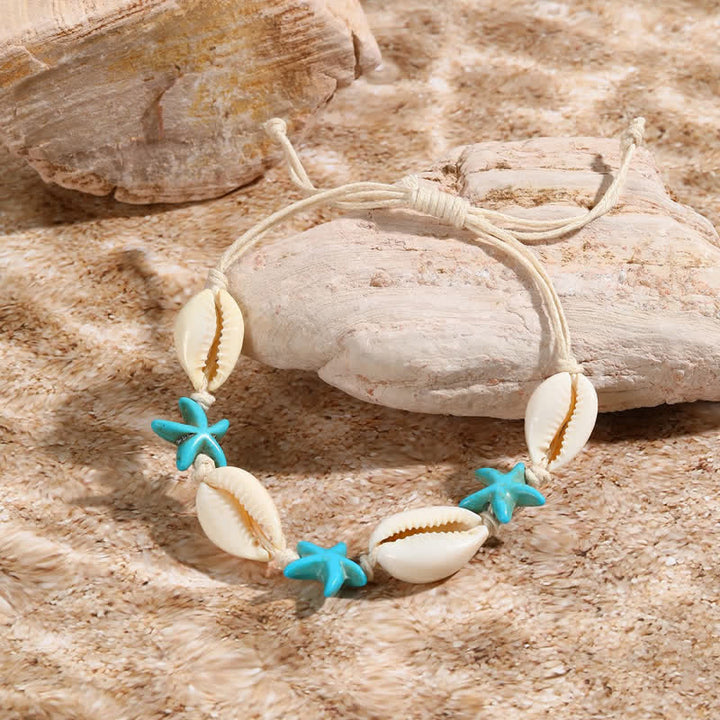 Bracelet de plage avec pendentif tortue étoile de mer turquoise blanche Olivenorma
