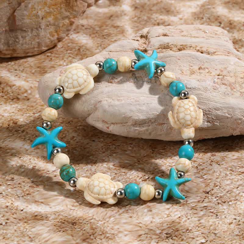 Bracelet de plage avec pendentif tortue étoile de mer turquoise blanche Olivenorma