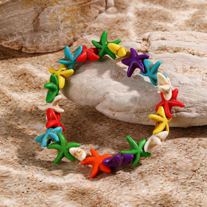 Bracelet de plage avec pendentif tortue étoile de mer turquoise blanche Olivenorma