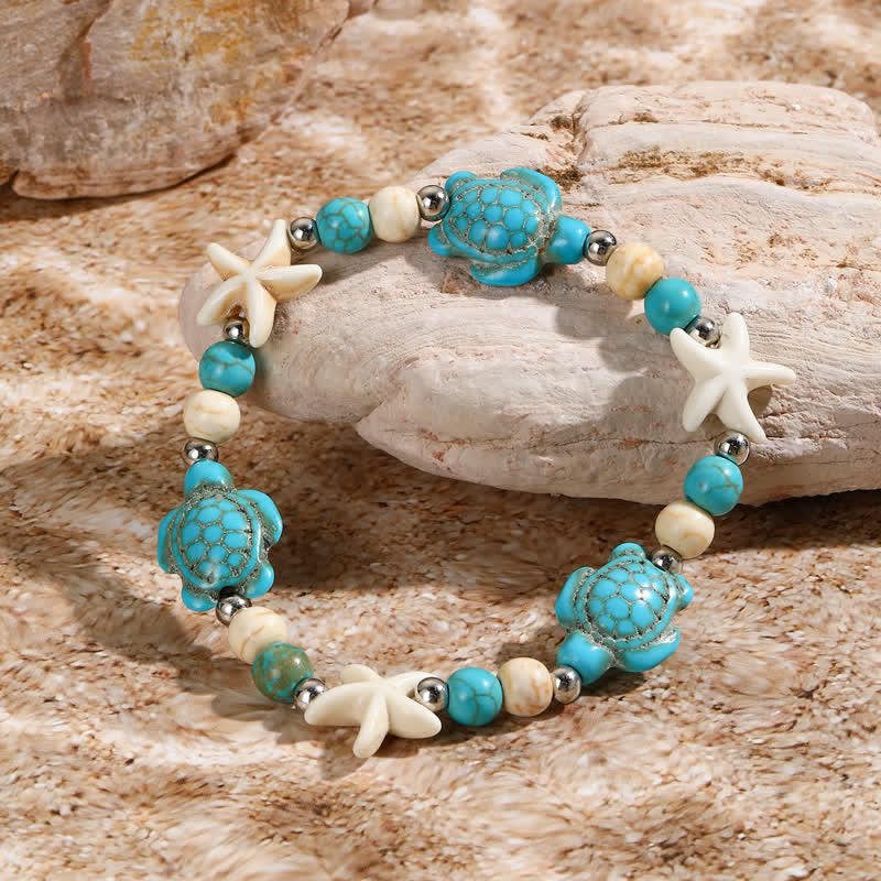 Bracelet de plage avec pendentif tortue étoile de mer turquoise blanche Olivenorma