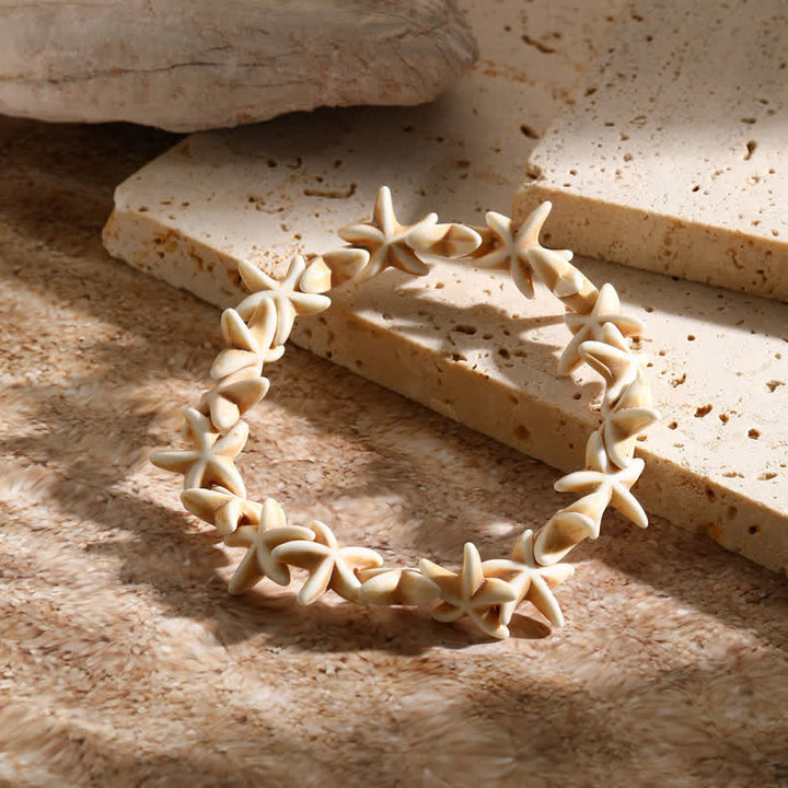 Bracelet de plage avec pendentif tortue étoile de mer turquoise blanche Olivenorma