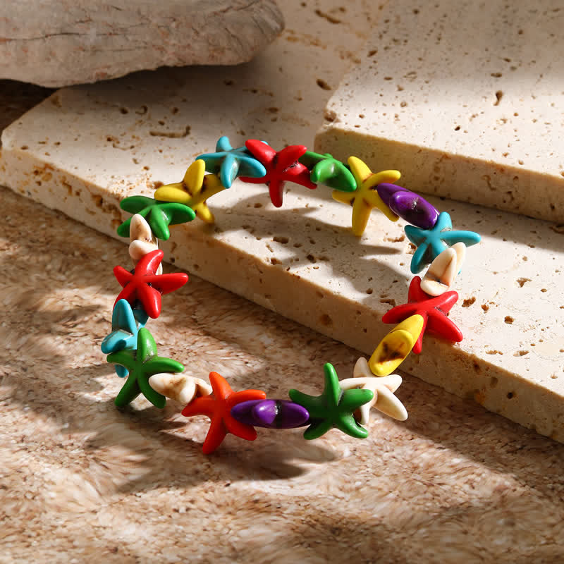 Bracelet de plage avec pendentif tortue étoile de mer turquoise blanche Olivenorma