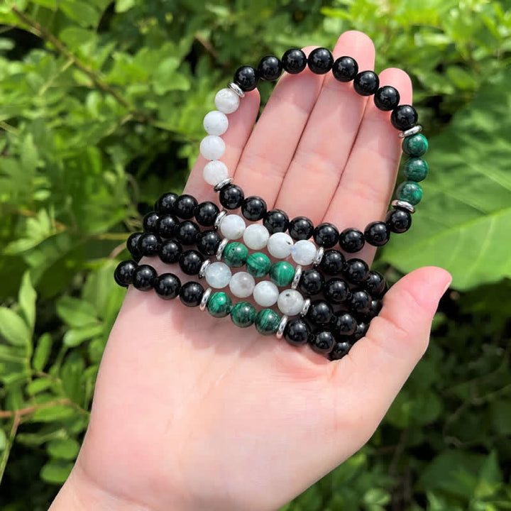 Bracelet en perles de pierre de lune, obsidienne, malachite et pierre de Olivenorma