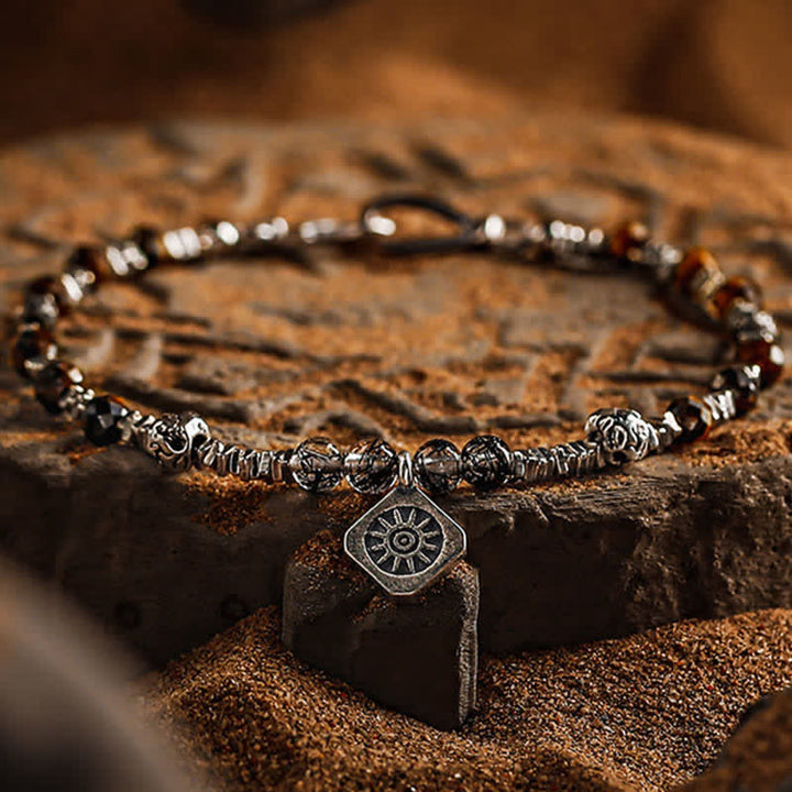 Bracelet en perles de quartz noir et œil de tigre rutile Olivenorma