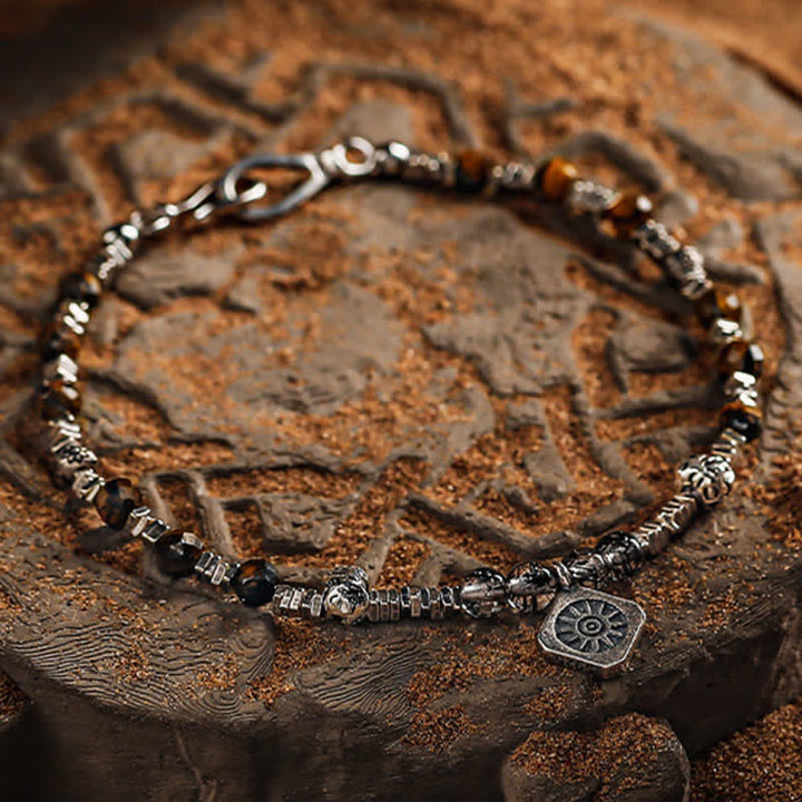 Bracelet en perles de quartz noir et œil de tigre rutile Olivenorma