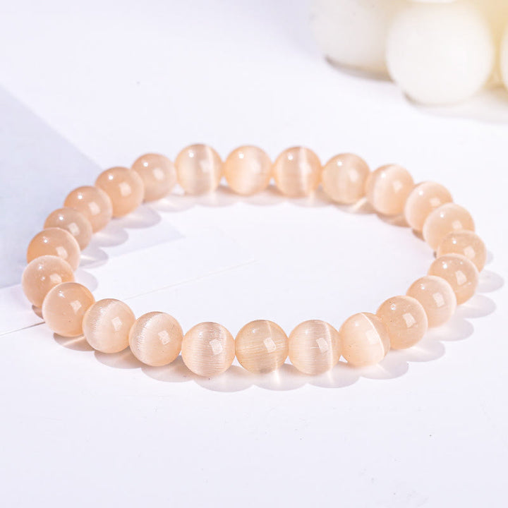 Bracelet en perles de pierre œil de chat coloré Olivenorma 6-10 mm