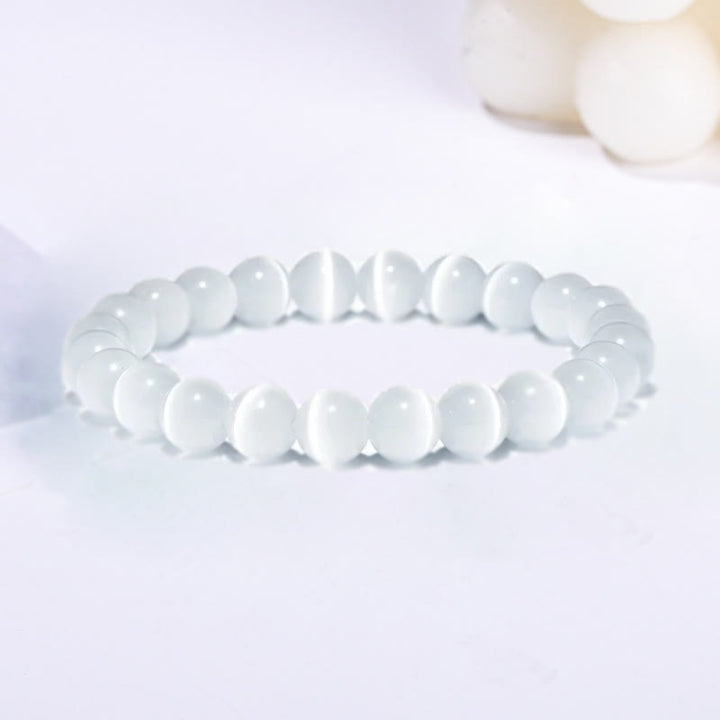 Bracelet en perles de pierre œil de chat coloré Olivenorma 6-10 mm