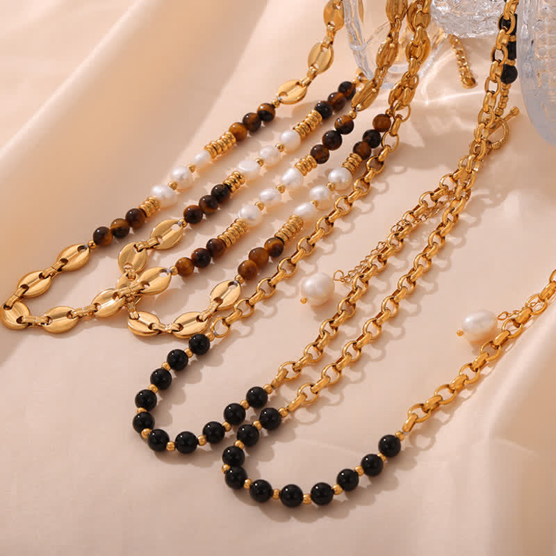 Collier en acier titane et perles d'eau douce en obsidienne œil de tigre Olivenorma