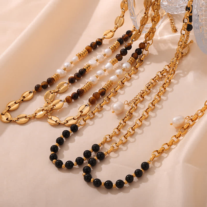 Collier en acier titane et perles d'eau douce en obsidienne œil de tigre Olivenorma