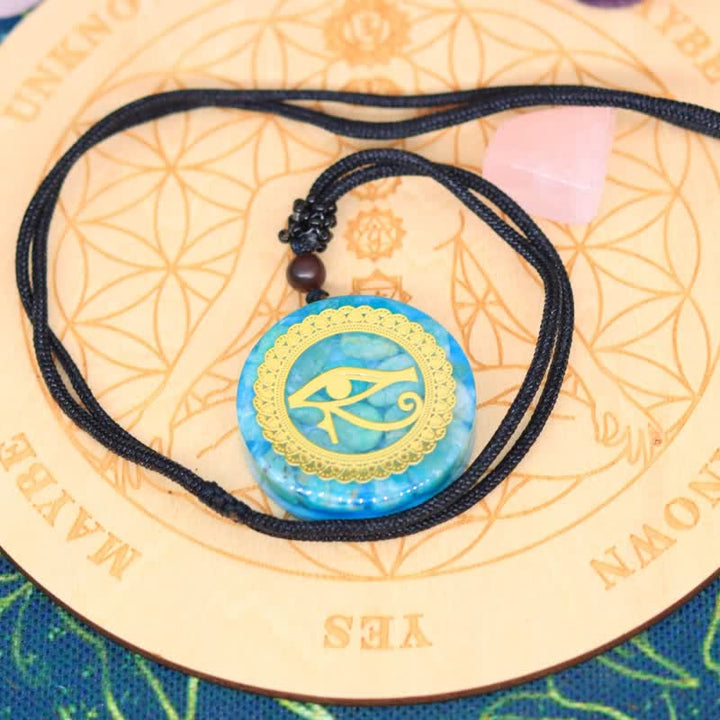 Collier Orgone Oeil d'Horus en Aigue-Marine Naturelle Olivenorma