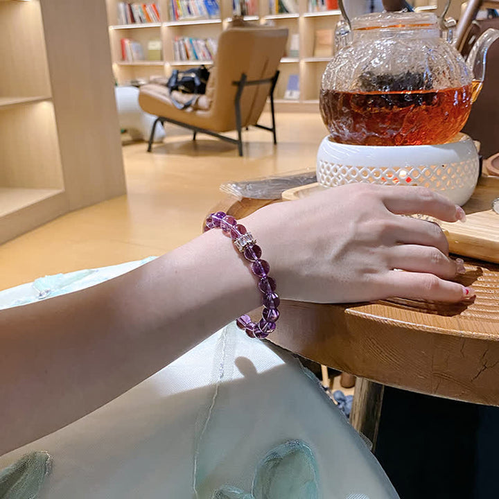 Bracelet en perles d'améthyste naturelle Olivenorma « Previewer »