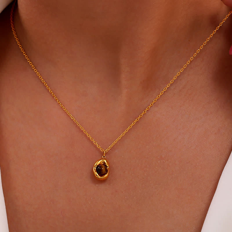 Ensemble de bijoux en acier titane irrégulier avec œil de tigre naturel Olivenorma