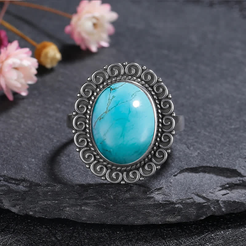 Bague ovale en pierre naturelle sculptée de tournesol Olivenorma