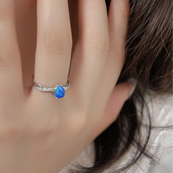 Bague Olivenorma en forme de goutte d'eau avec opale bleue et zircon blanc