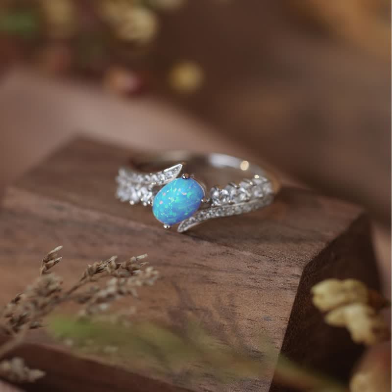 Bague ailes enveloppées en opale bleue naturelle Olivenorma