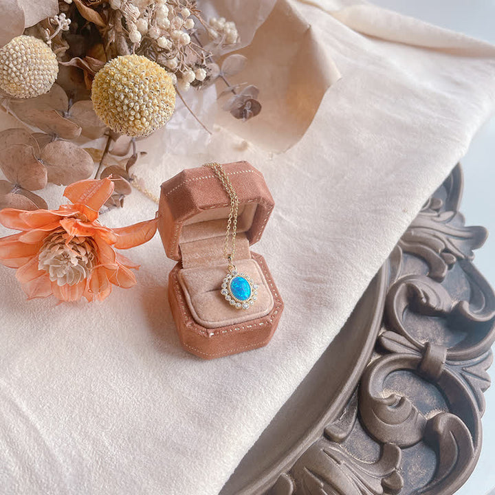 Collier pendentif ovale gravé en opale bleue Olivenorma