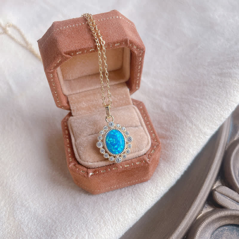Collier pendentif ovale gravé en opale bleue Olivenorma
