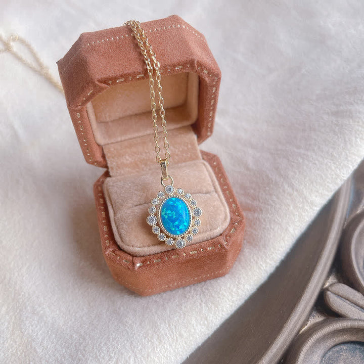 Collier pendentif ovale gravé en opale bleue Olivenorma