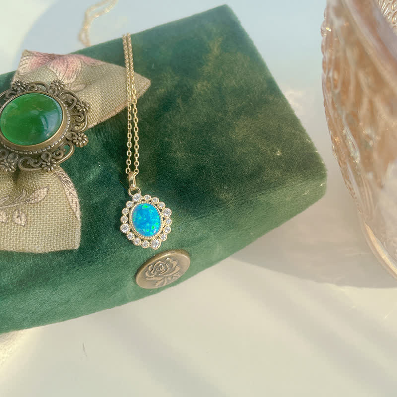 Collier pendentif ovale gravé en opale bleue Olivenorma