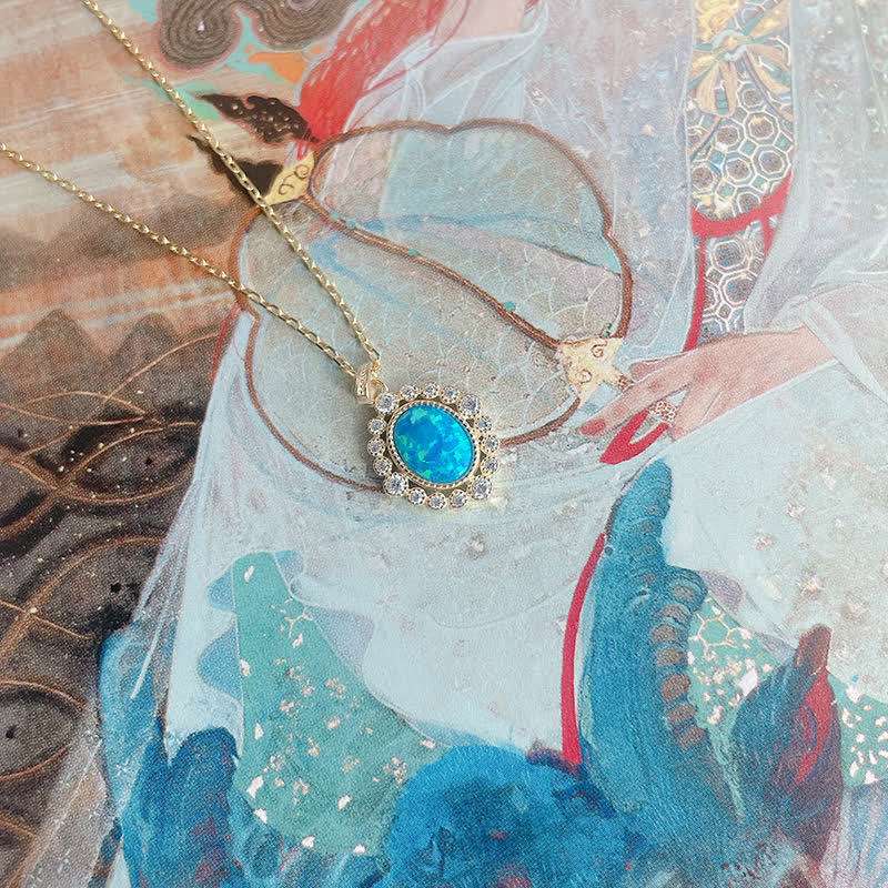 Collier pendentif ovale gravé en opale bleue Olivenorma