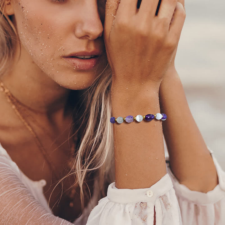 Bracelet en perles de cristal irrégulières naturelles en pierre œil de chat Olivenorma