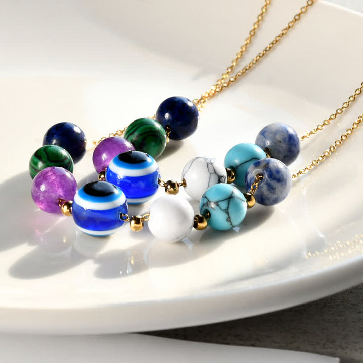 Collier de perles en pierre naturelle Olivenorma fabriqué à la main contre le mauvais œil