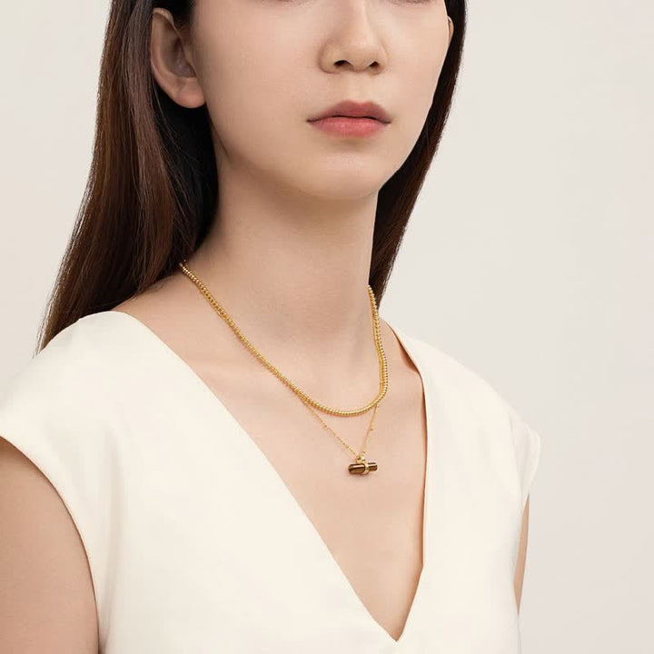 Collier pendentif en bois équilibrant en œil de tigre naturel Olivenorma