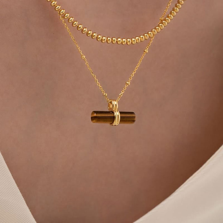 Collier pendentif en bois équilibrant en œil de tigre naturel Olivenorma