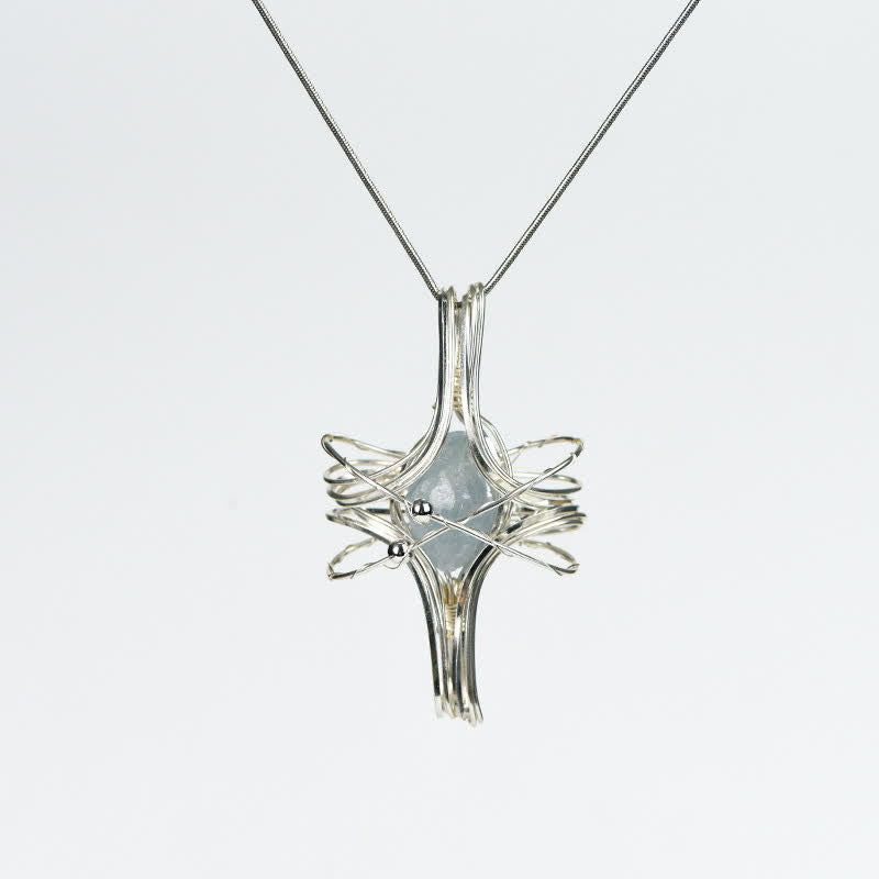 Collier pendentif planète octaédrique enroulé à la main en cristal naturel Olivenorma