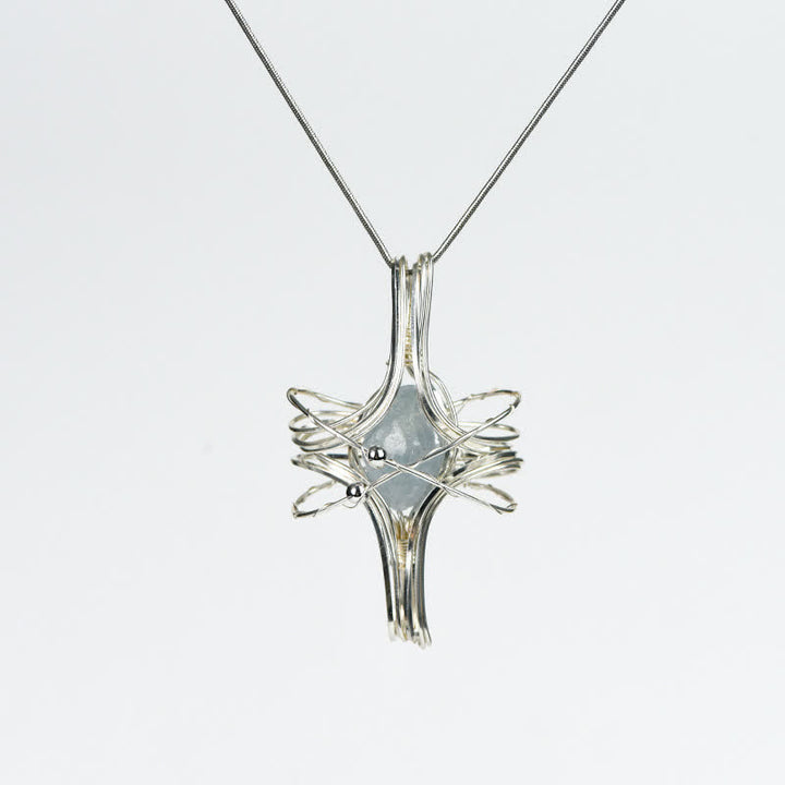 Collier pendentif planète octaédrique enroulé à la main en cristal naturel Olivenorma