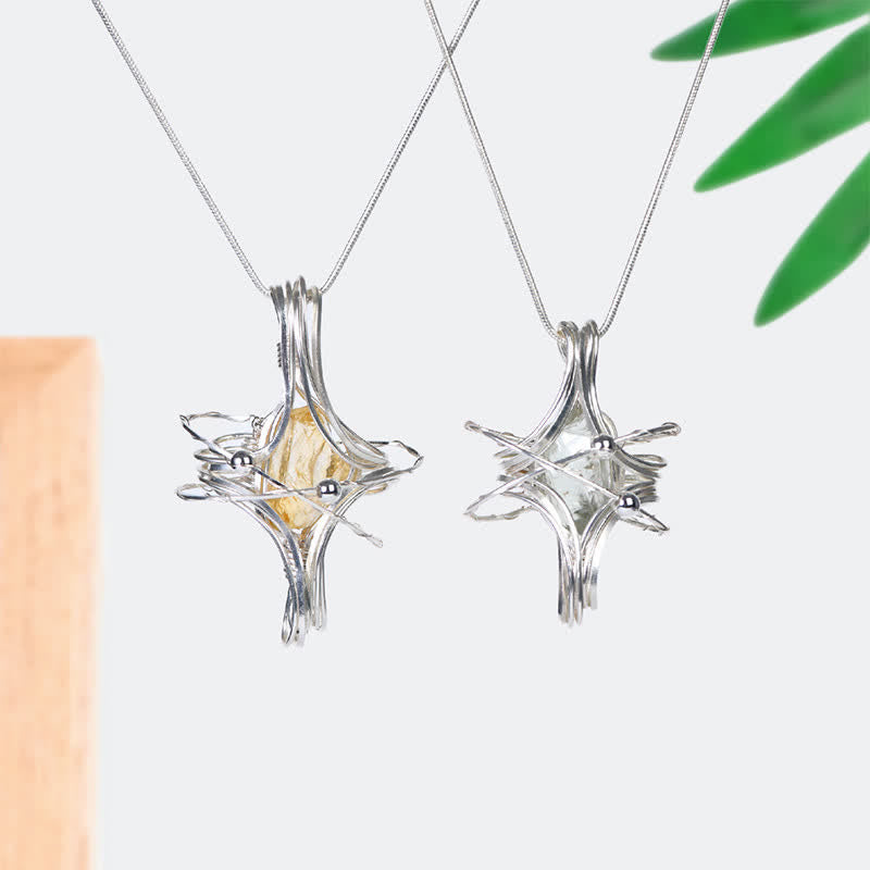 Collier pendentif planète octaédrique enroulé à la main en cristal naturel Olivenorma