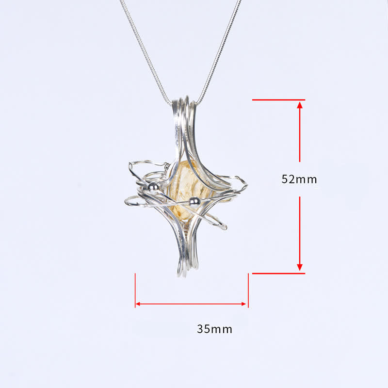Collier pendentif planète octaédrique enroulé à la main en cristal naturel Olivenorma