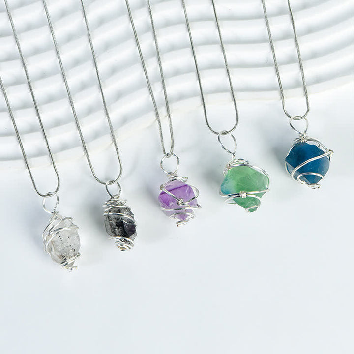 Collier pendentif longue colonne enroulé à la main en cristal naturel Olivenorma