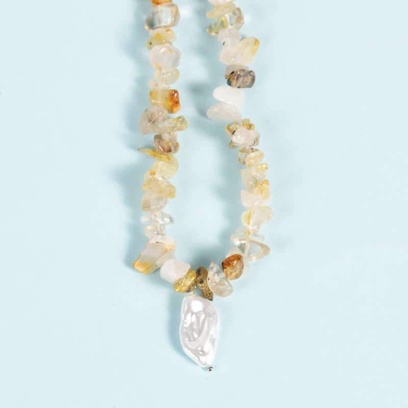 Collier avec pendentif en perles de gravier naturel et perles de soleil et de lune Olivenorma