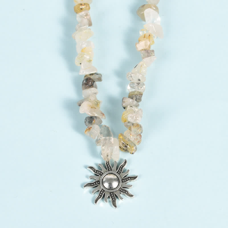 Collier avec pendentif en perles de gravier naturel et perles de soleil et de lune Olivenorma