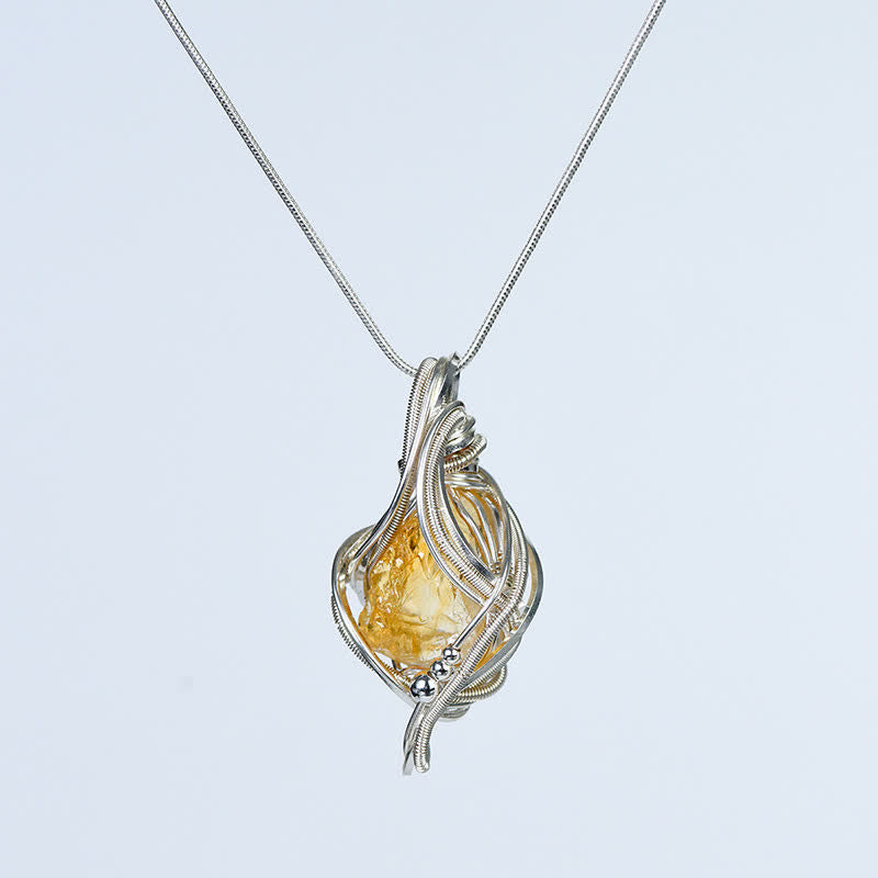 Collier pendentif en cristal naturel enveloppé « Générateur d'énergie » Olivenorma