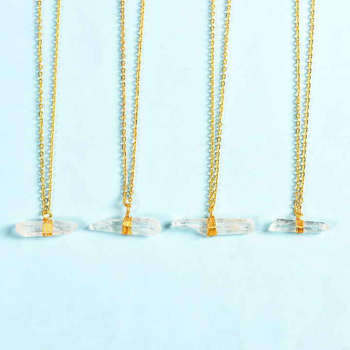 Collier pendentif en quartz transparent avec fil enroulé en métal Olivenorma